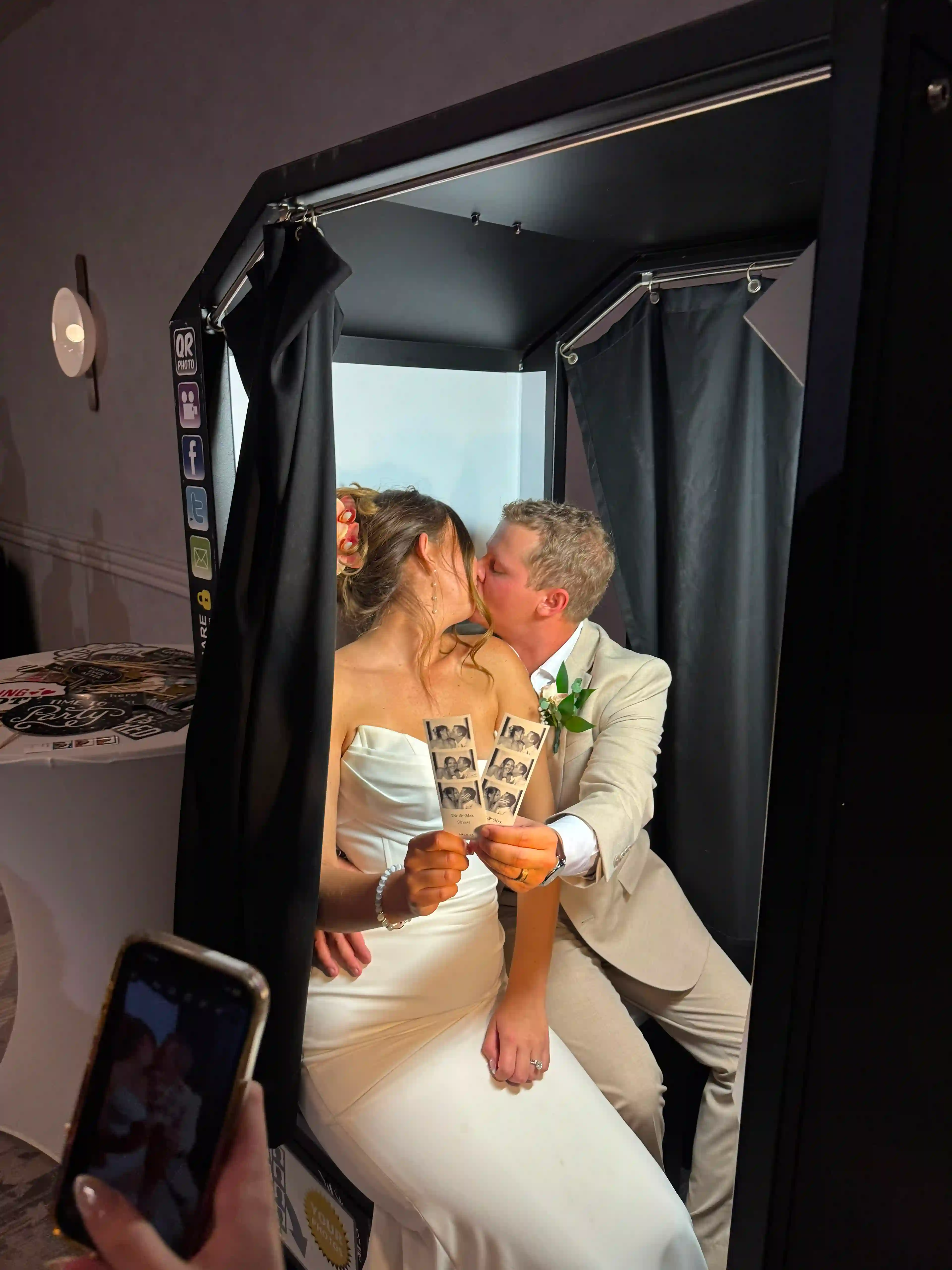 Open-air photo booth setup with backdrop at an Orlando event