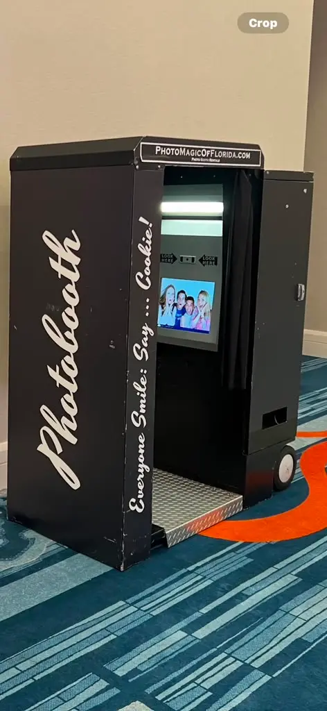 Photo Magic booth attendant setup at a Central Florida celebration